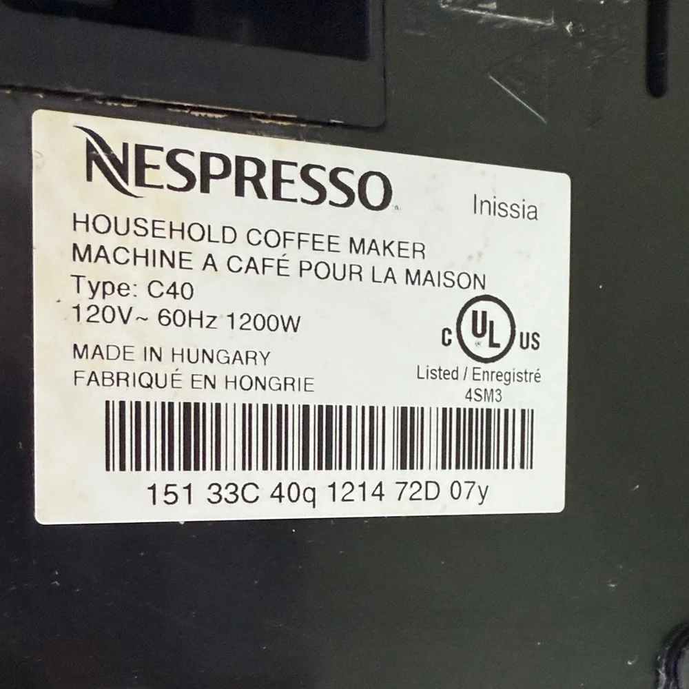 Nespresso White and Black Coffee Maker